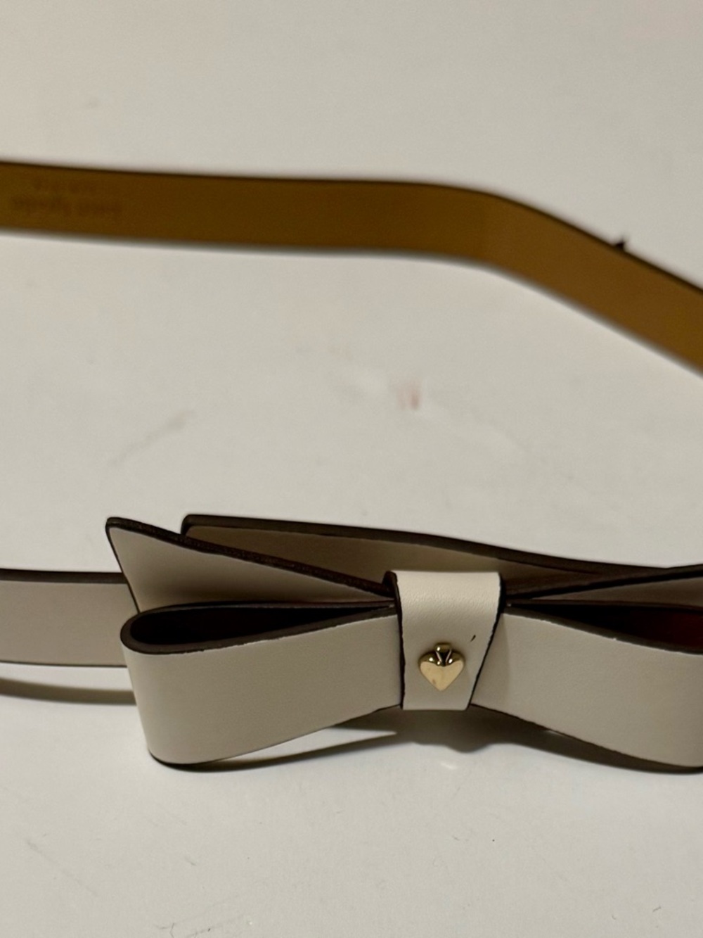 kate spade Cream Bow Leather Belt with Gold Heart Accent